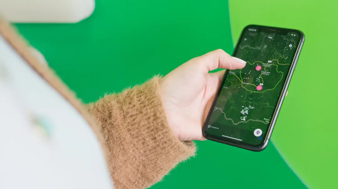 A person holds a smartphone.