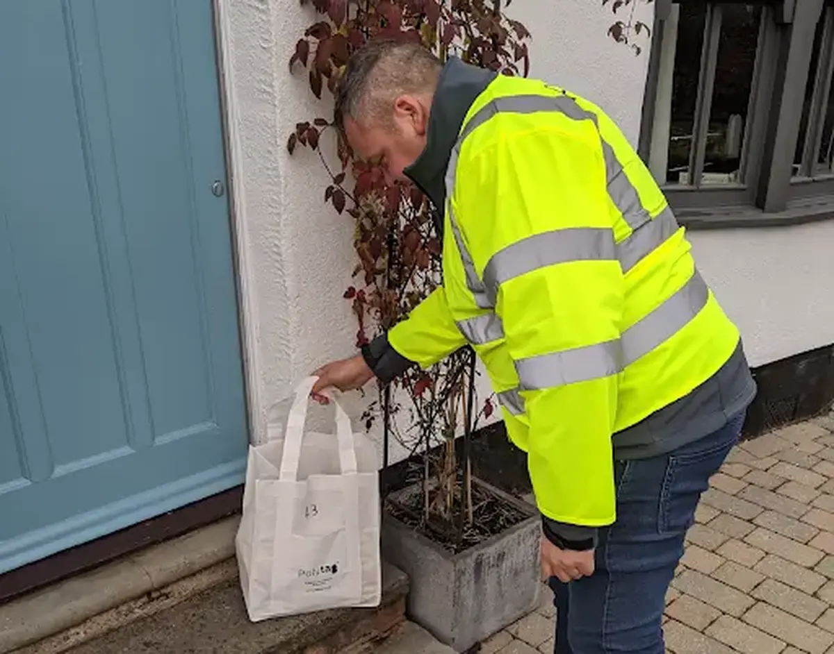 Man collecting recycling